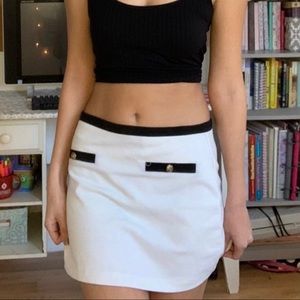 White skirt with gold buttons